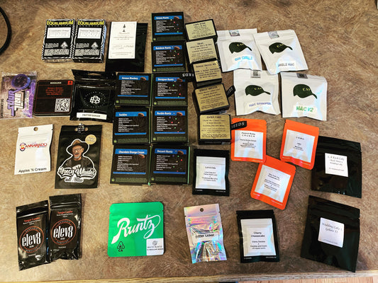 Cannabis seed collection showing multiple seed branded packets.