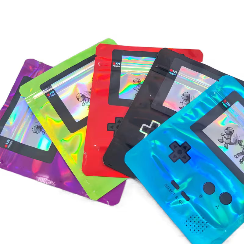 Colorful handheld gaming consoles on a white background