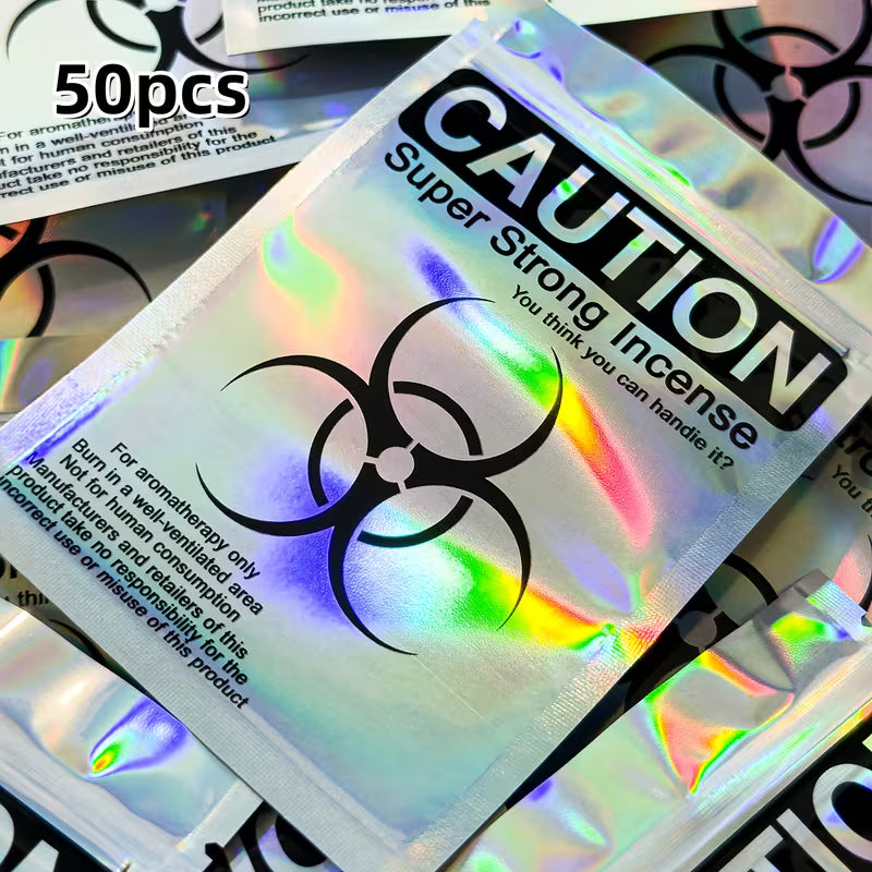 Holographic resealable Mylar seed storage bags with iridescent finish and caution-style design, suitable for small collectible seed storage