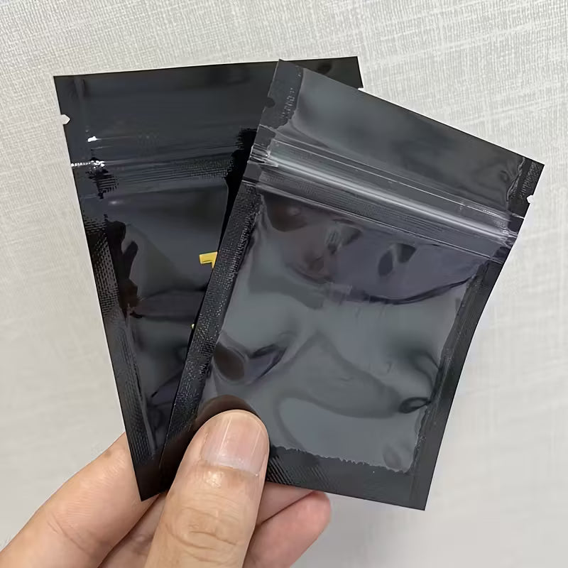 Clear reusable Mylar zip-lock seed storage bags sized 7.5 by 10 centimetres, supplied as a 100 pack for organised collectible seed storage