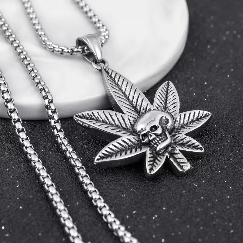 Silver cannabis leaf skull pendant necklace with engraved leaf detailing