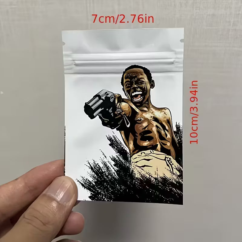 Small pouch with a graphic design of a person holding a gun, held by a hand against a plain background.